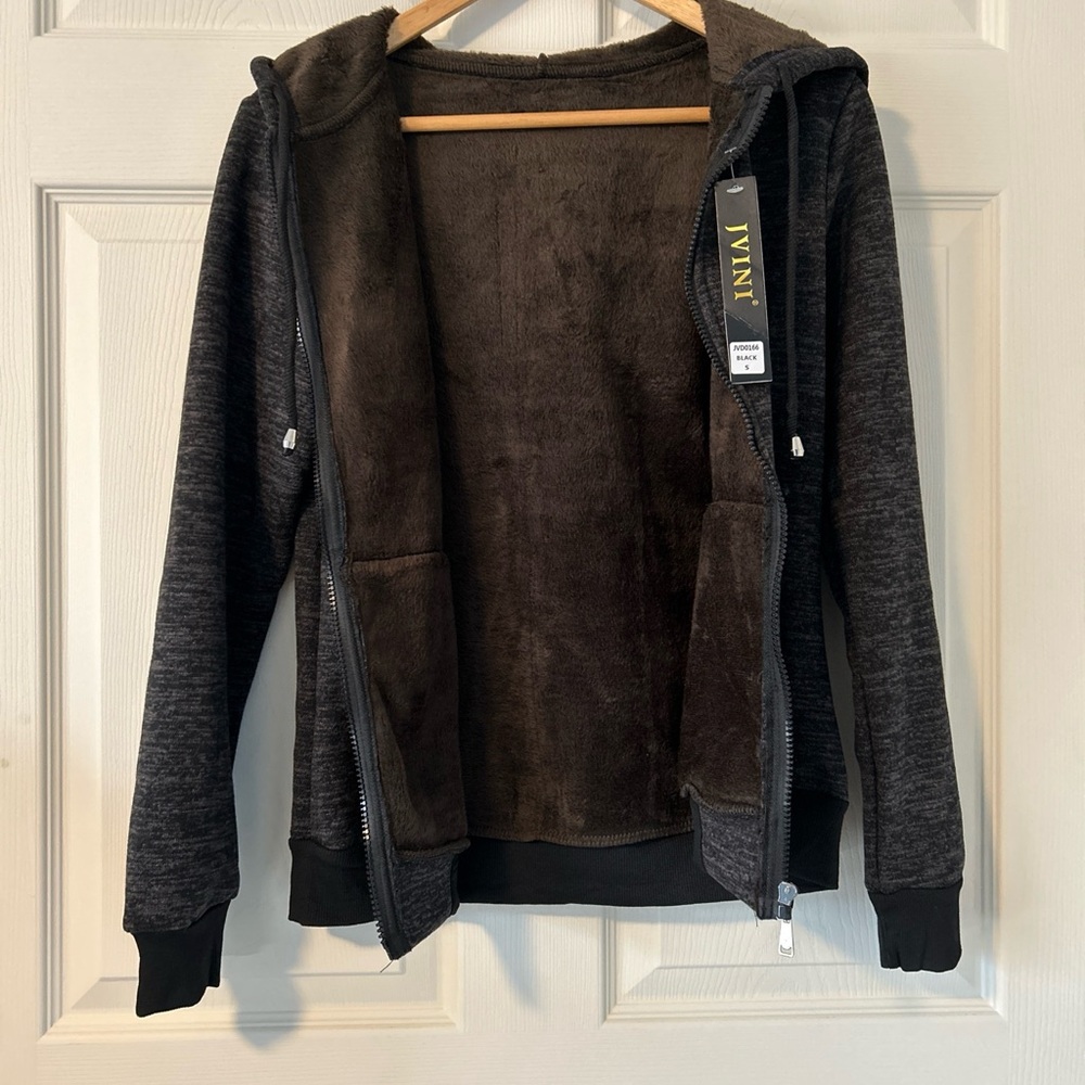 JVINI size small fleece lined jacket in black. New with tags